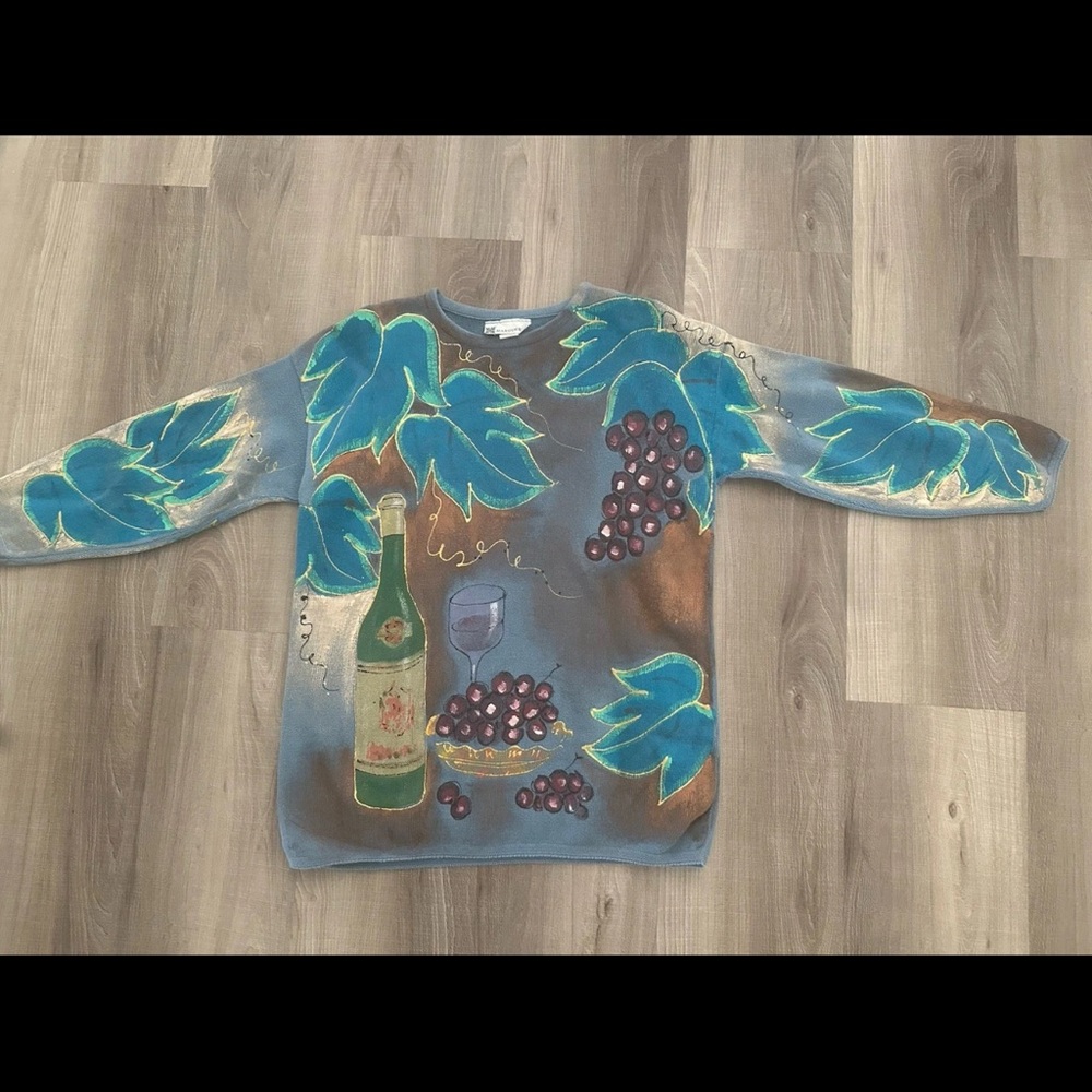 Artistic Blue Sweater with Leaf and Grape Design
